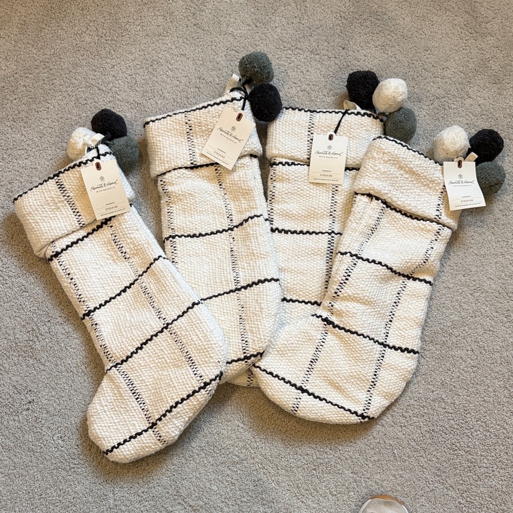 Set of 4 Cream Knit Holiday Stockings with Deep  Gray  Windowpane and Pom-Poms